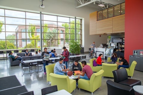 people relaxing in student lounge
