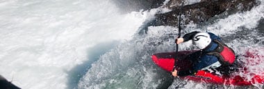 student kayaking